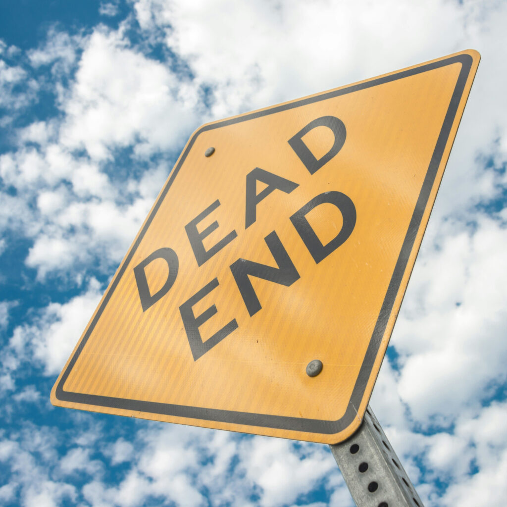 Imagebild zum Beitrag: Straßenschild "Dead End" vor einem bewölkten Himmel.